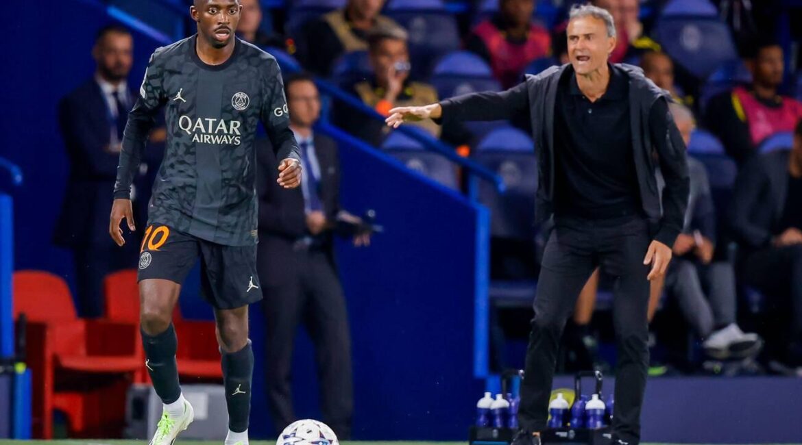 PARIS, FRANCE - SEPTEMBER 19: Ousmane Dembele (Paris Saint-Germain) and Trainer Luis Enrique (Paris Saint-Germain)