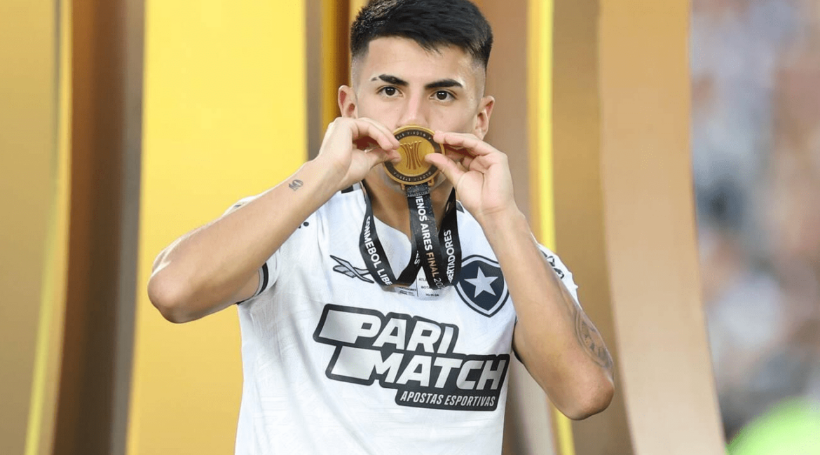 Buenos Aires, Argentina. 01st Dec, 2024. Thiago Almada of Botafogo kisses the medal during the Conmebol Libertadores 2024 final match between Clube Atletico Mineiro and Botafogo FR played at Monumental Stadium on November 30 in Buenos Aires. (Photo by Miguel Marruffo/PRESSINPHOTO) Credit: PRESSINPHOTO SPORTS AGENCY/Alamy Live News