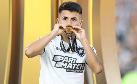 Buenos Aires, Argentina. 01st Dec, 2024. Thiago Almada of Botafogo kisses the medal during the Conmebol Libertadores 2024 final match between Clube Atletico Mineiro and Botafogo FR played at Monumental Stadium on November 30 in Buenos Aires. (Photo by Miguel Marruffo/PRESSINPHOTO) Credit: PRESSINPHOTO SPORTS AGENCY/Alamy Live News